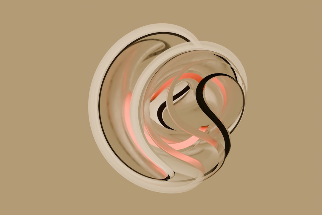A picture of a circular object with a pink light